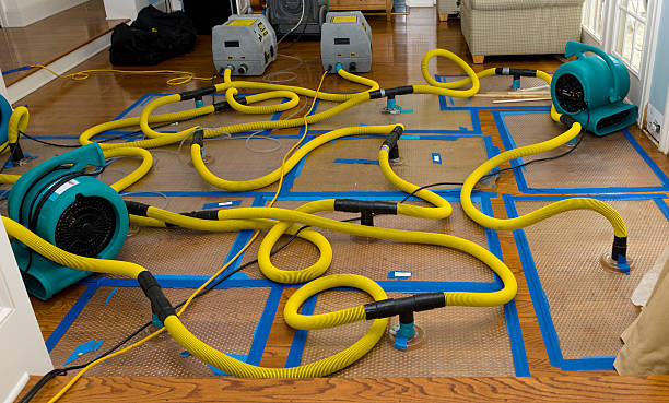 Professional Storm Water Damage Restoration technician working in Lake Mills, WI